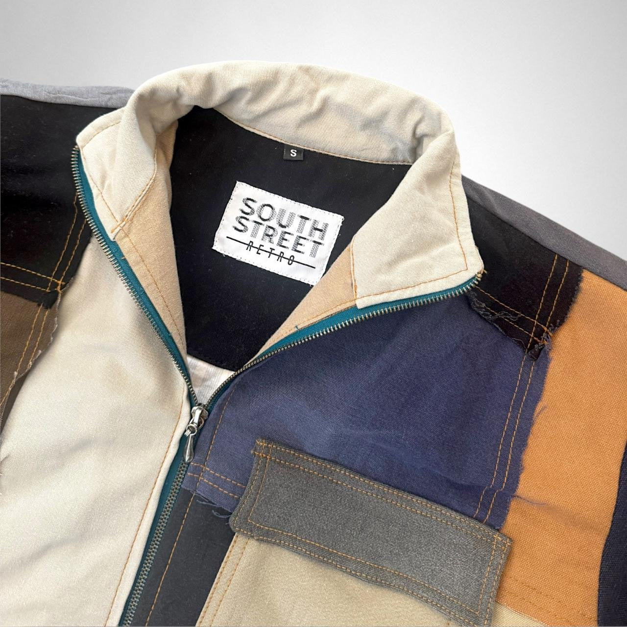 Reworked Patchwork South Street Retro Jacket – Upcycled Vintage 90s Streetwear Essential