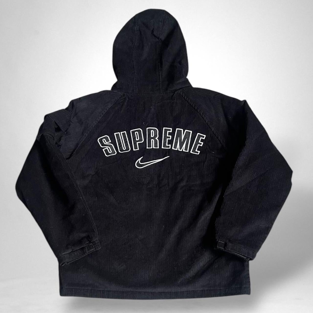 Nike x Supreme black corduroy jacket featuring premium material and limited-edition streetwear design