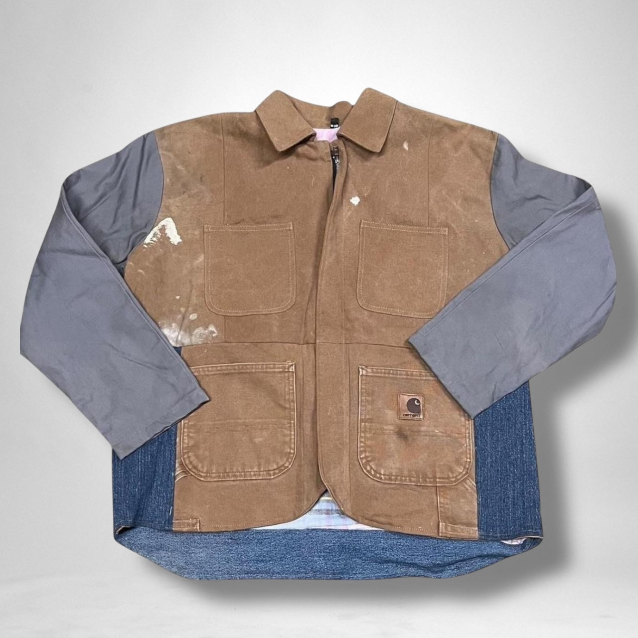 Reimagined Carhartt jacket made from vintage workwear, redesigned with custom street style elements.