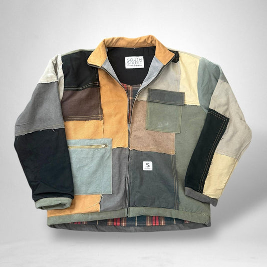 Retro patchwork reworked jacket from South Street featuring vintage 90s upcycled streetwear design