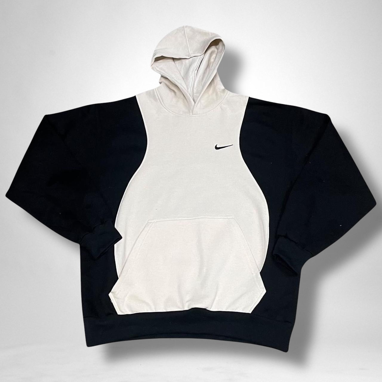Reworked Nike hoodie in beige and black with patchwork design, vintage streetwear style, unisex.