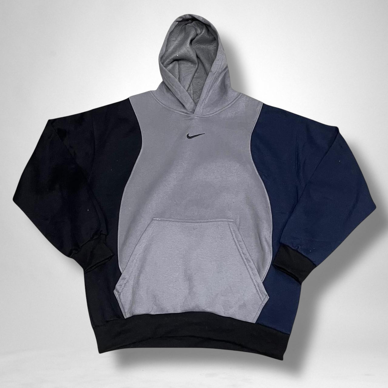 Reworked Nike hoodie in black, grey, and navy with patchwork design, custom vintage streetwear pullover for men and women