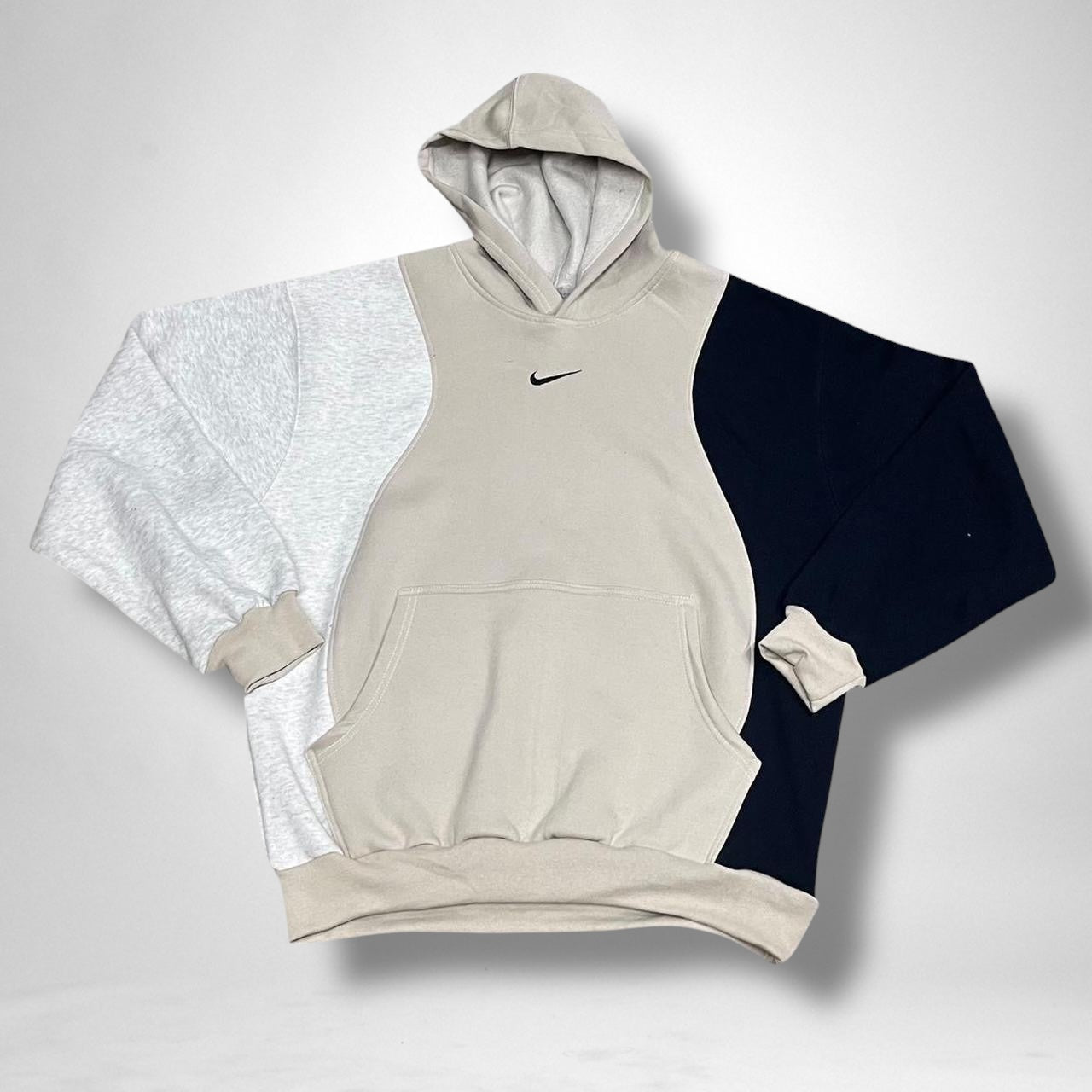 Custom reworked Nike hoodie in grey, beige, and black with colorblock design, streetwear-inspired upcycled fashion