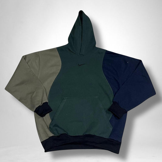 Reworked Nike hoodie in khaki and navy featuring upcycled design, vintage streetwear aesthetic, unisex fit