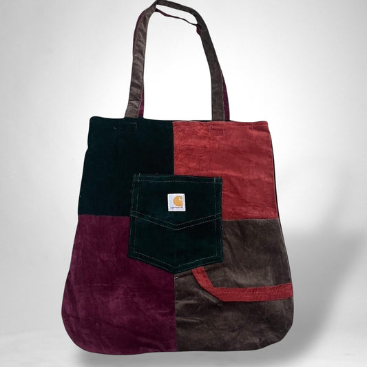 Handmade reworked Carhartt tote bag made from upcycled canvas workwear, featuring durable straps and a rugged, vintage look