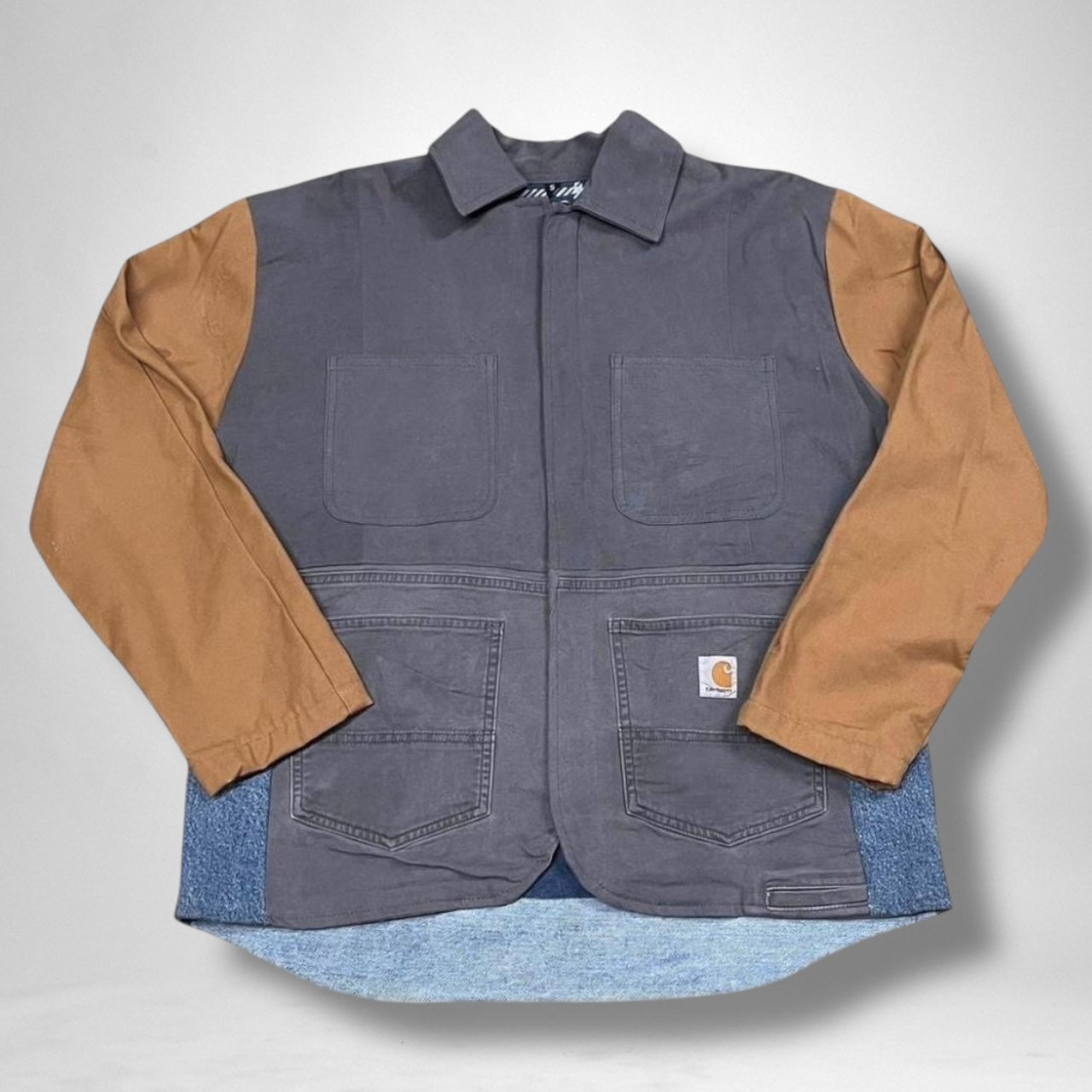 Upcycled Carhartt jacket featuring handcrafted details and vintage-inspired modern workwear design.