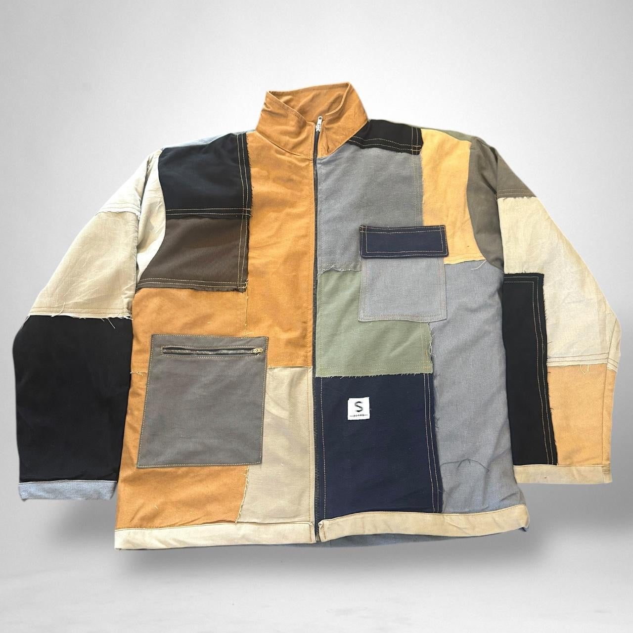 Vintage reworked patchwork jacket from South Street Retro featuring bold 90s streetwear design and sustainable upcycled materials